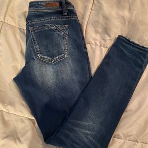 Buckle black skinny jeans